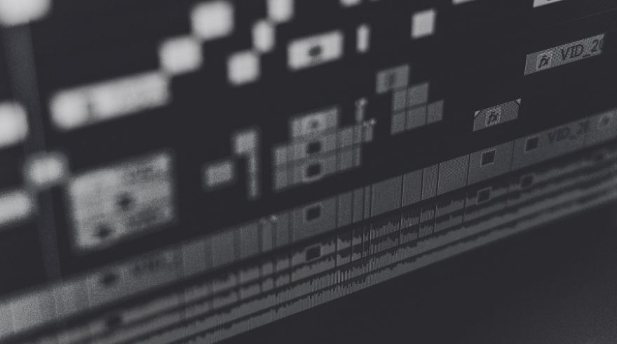 Voice over for brand films shown as a highlighted audio waveform on a videographer's editing timeline.