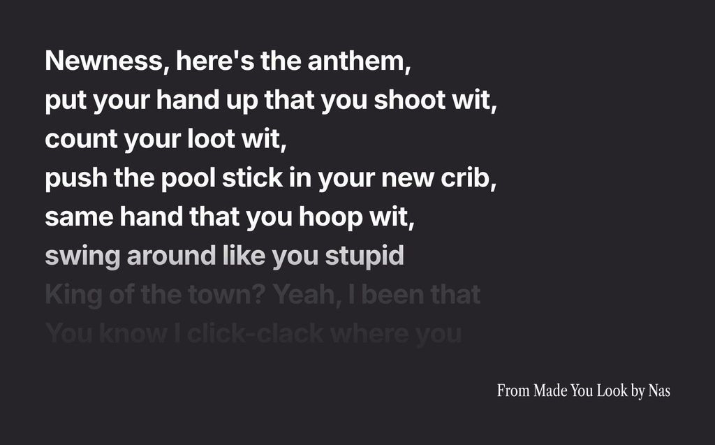 White rap lyrics from Nas’s “Made You Look” are shown on a dark background, with the last two lines faded and less visible than the others.